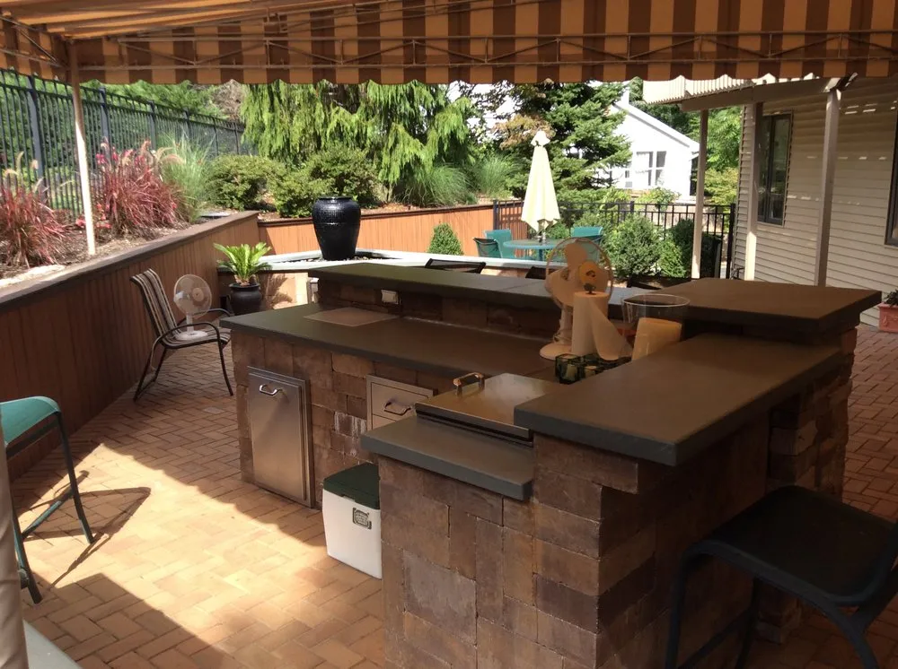 Professional landscape installation in Miller Place, NY by Designs by O'Neil & Associates