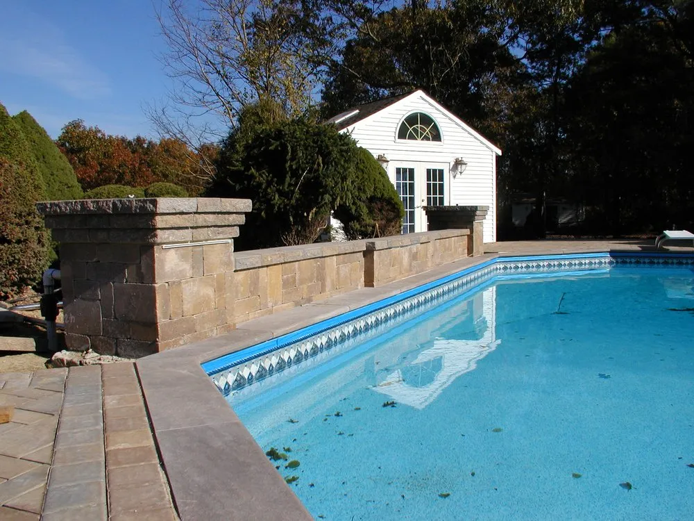 Affordable landscape installation for residential properties in Miller Place, NY by Designs by O'Neil & Associates