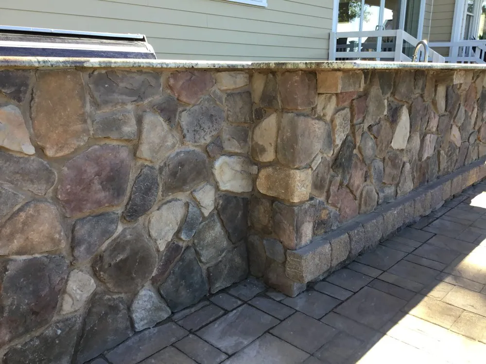 Expert lawn mowing service for residential properties across Miller Place, NY - Designs by O'Neil & Associates