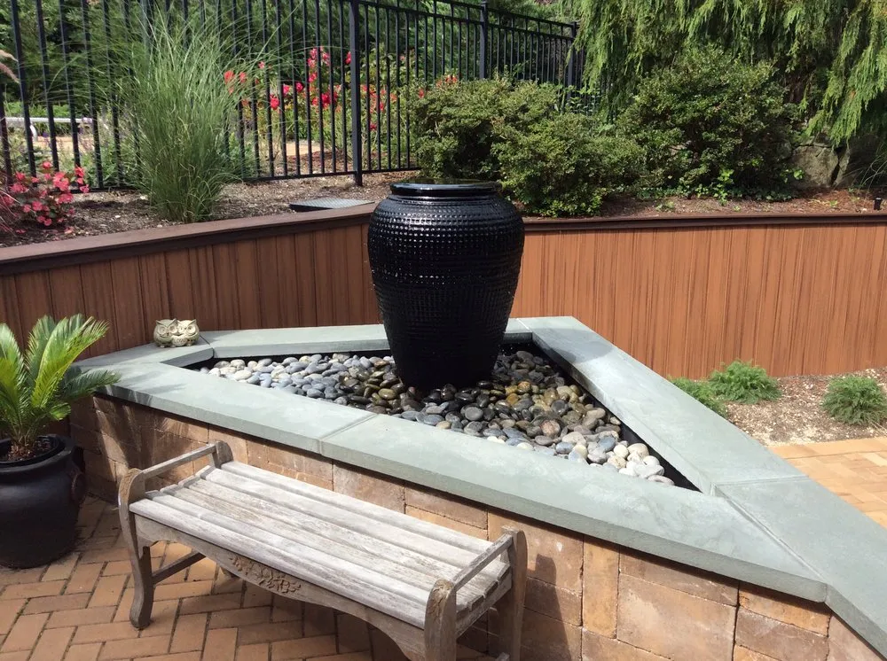 Affordable landscape design in Miller Place, NY by Designs by O'Neil & Associates