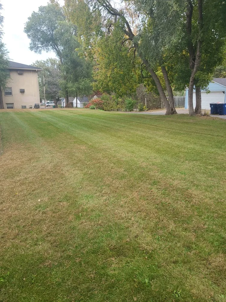 Trusted lawn mowing service for year-round maintenance across Mounds View, MN - Designscape Creations