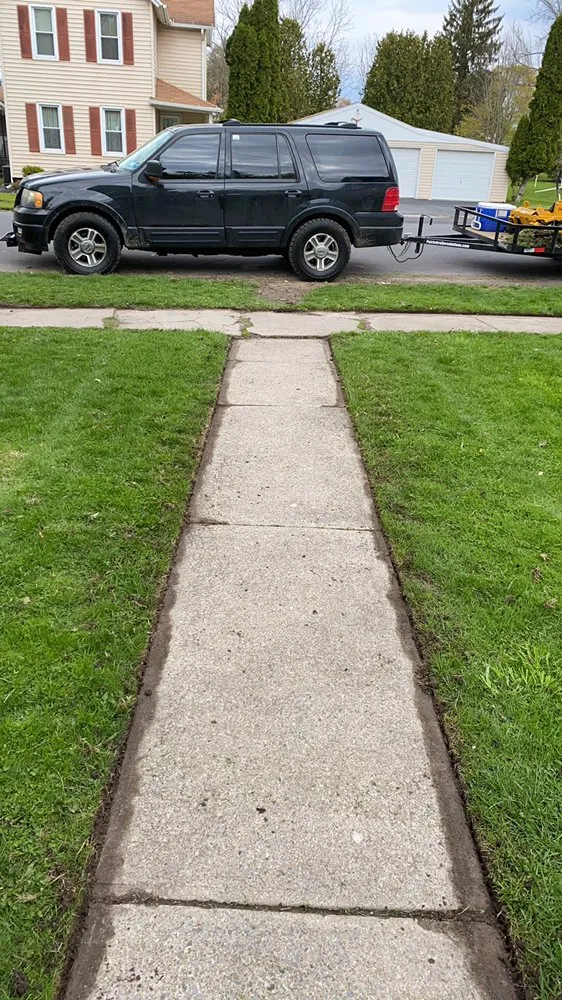 Top-rated lawn care service with custom design in Auburn, NY by Desmons Property Management