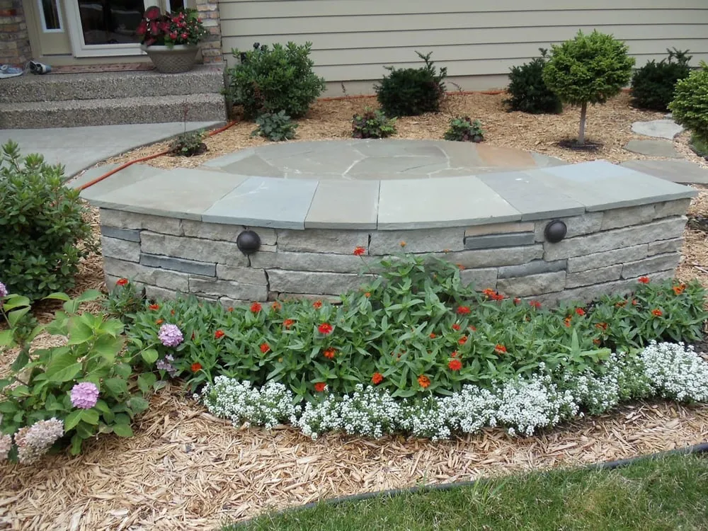 Expert landscaping services with custom design across Farmington, MN - Detail Stone