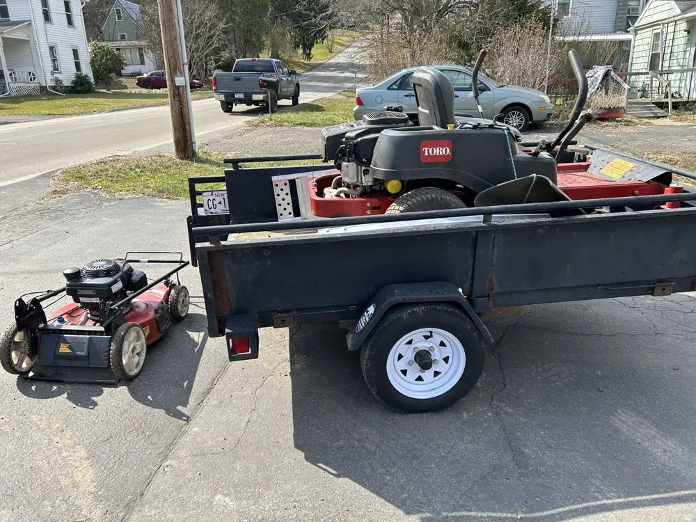 Custom lawn mowing service for residential properties in Corning, NY by DETER LAWN SCULPTURES