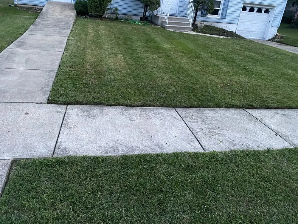 Trusted lawn mowing service with custom design across Newark, DE - Devis And Son