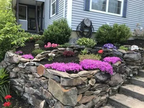 Local landscaping services for year-round maintenance in Vassalboro, ME by Devon's Property Maintenance