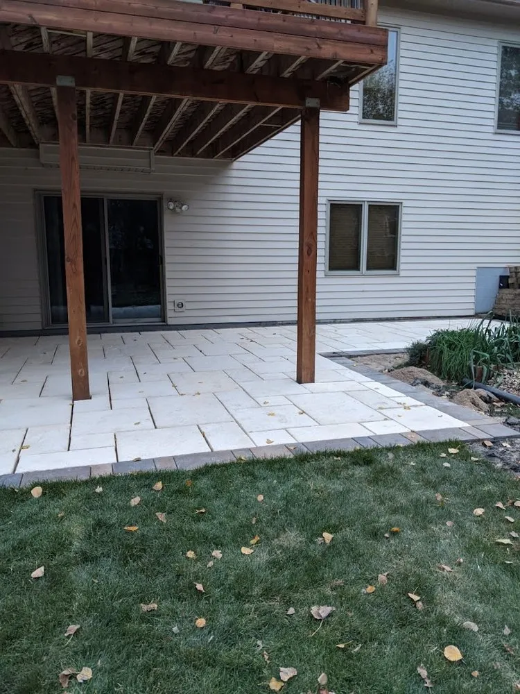 Professional landscaping services for year-round maintenance in Coon Rapids, MN by DeVries Lawn and Landscape