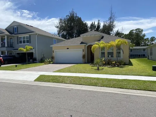 Devries Lawn Service Logo