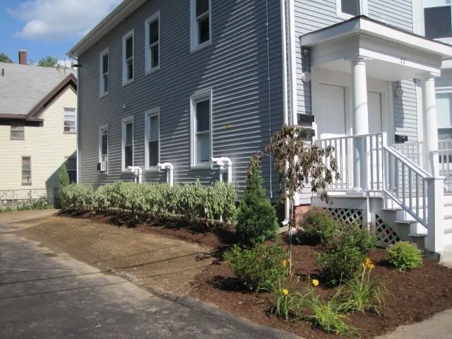 Professional lawn care service for year-round maintenance in West Bridgewater, MA by DeZine Land Construction & Care