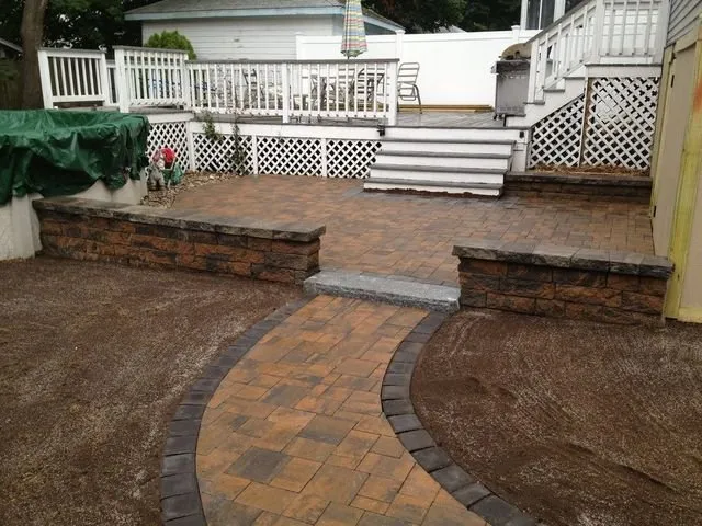 Professional lawn mowing service for year-round maintenance in West Bridgewater, MA by DeZine Land Construction & Care