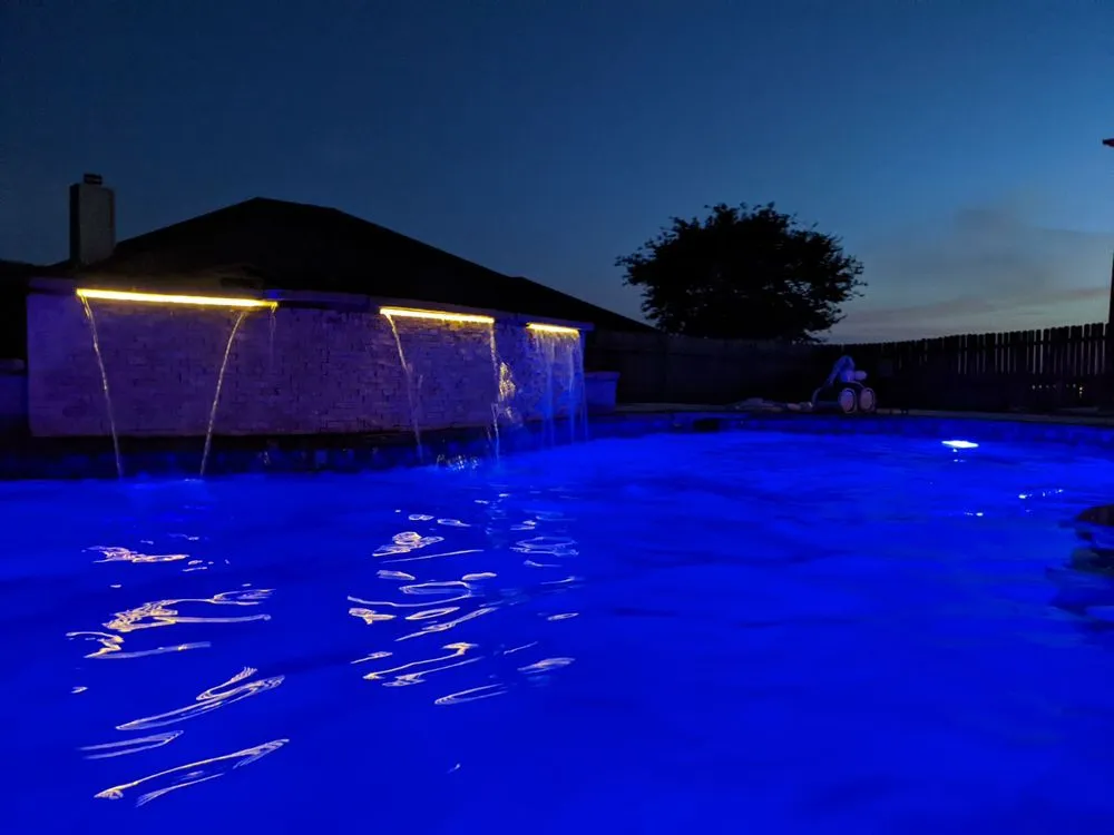 Professional lawn mowing service for residential properties in Garland, TX by DFW Modesto's Concrete