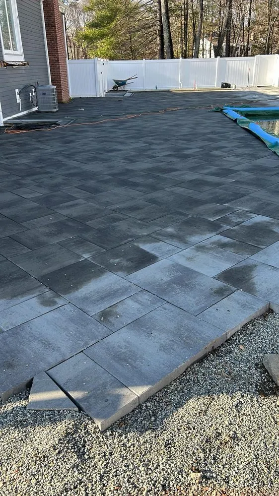 Custom outdoor landscaping with custom design in Lowell, MA by D&G Masonry and Stoneworks