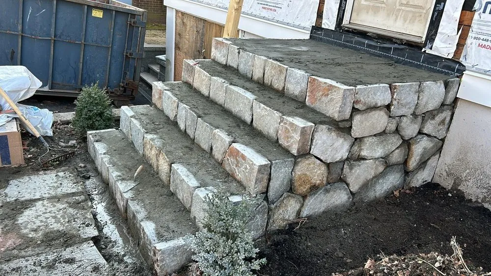 Custom yard cleanup service for outdoor upgrades in Lowell, MA by D&G Masonry and Stoneworks