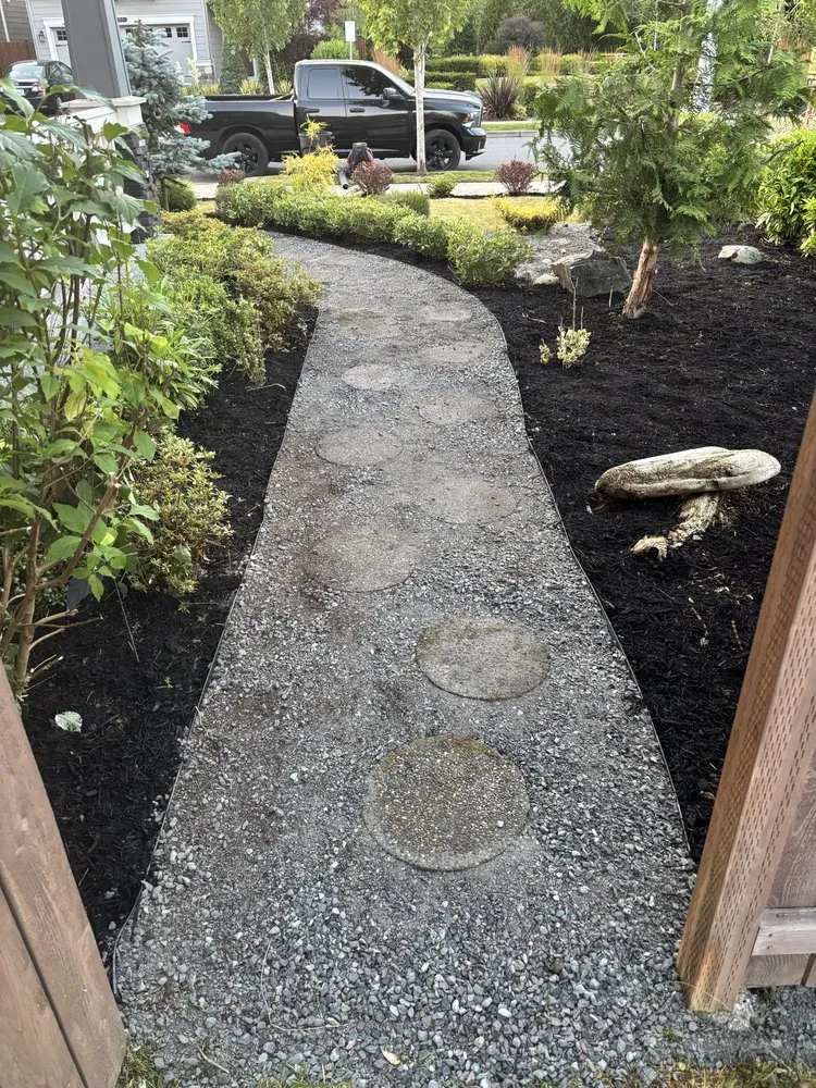 Local garden landscaping with custom design in Seattle, WA by DH Hauling and Demo