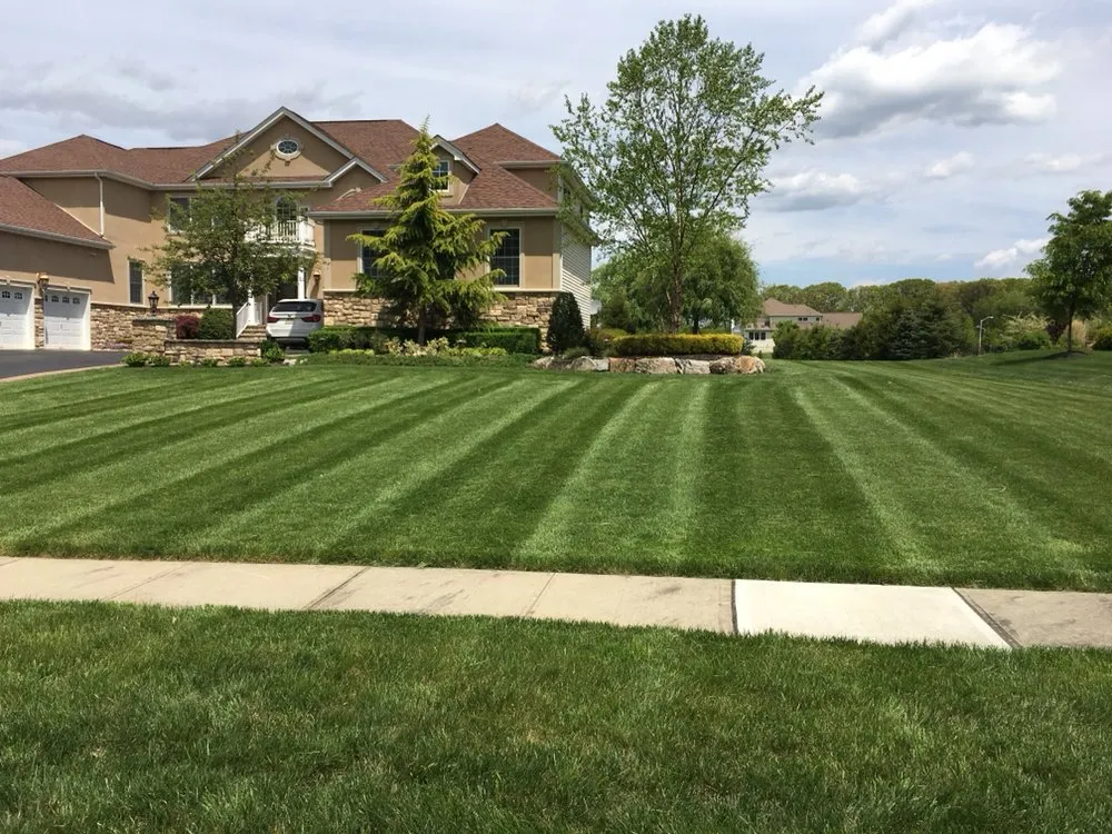 Custom landscaping services for residential properties in East Brunswick, NJ by Di Property Maintenance