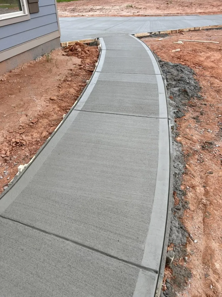 Custom lawn mowing service for residential properties in Newnan, GA by Diamond Concrete Landscaping And Junk Removal