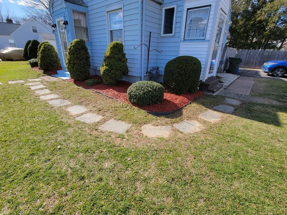 Custom yard cleanup service for homes in Plantsville, CT by Dill Landscaping & Fence