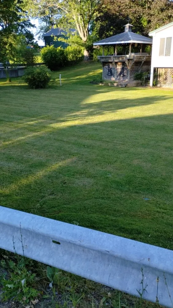 Custom lawn mowing service for year-round maintenance across Richland, NY - Dimitri's