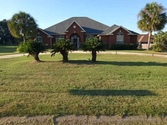 Dinkins Lawncare Services Logo