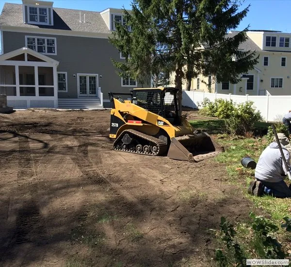 Reliable lawn mowing service for homes in Framingham, MA by Direct Landscaping Design