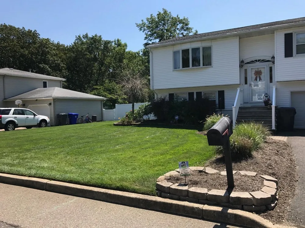 Trusted lawn mowing service in Eatontown, NJ by Dirt & Turf