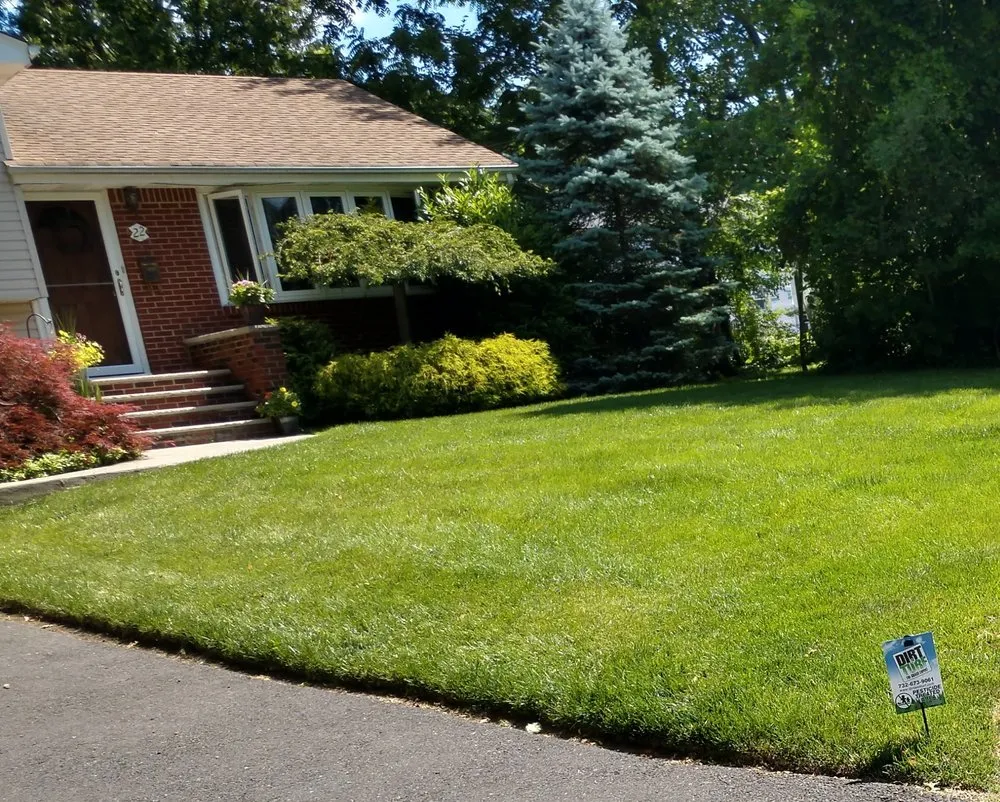 Custom landscape installation for year-round maintenance in Eatontown, NJ by Dirt & Turf