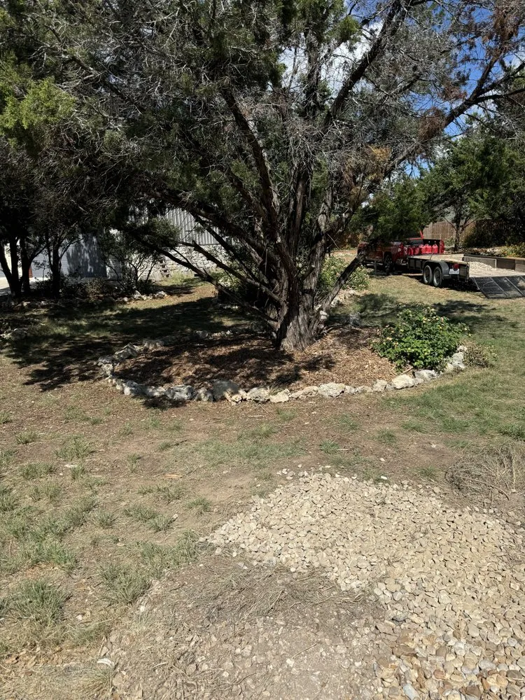 Custom lawn mowing service for residential properties in Lago Vista, TX by Dirt and Loader Services