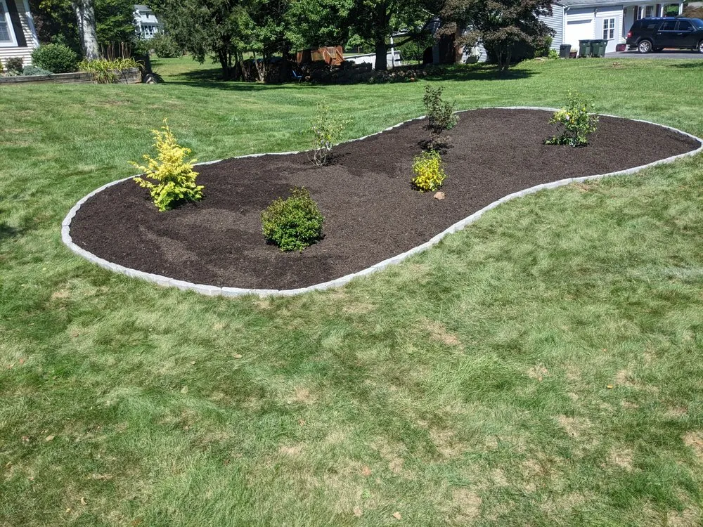 Reliable lawn care service in Newington, CT by Dirt and Stone Landscaping