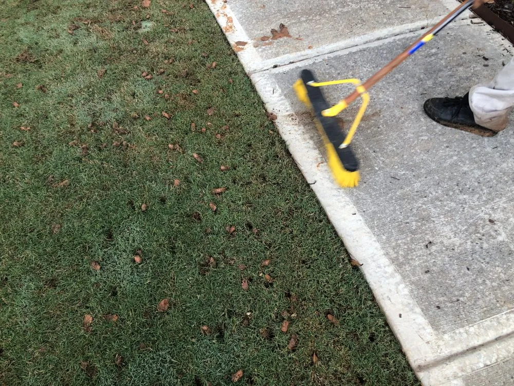 Expert lawn mowing service for year-round maintenance in Marietta, GA by Dirt Cheap Aerations