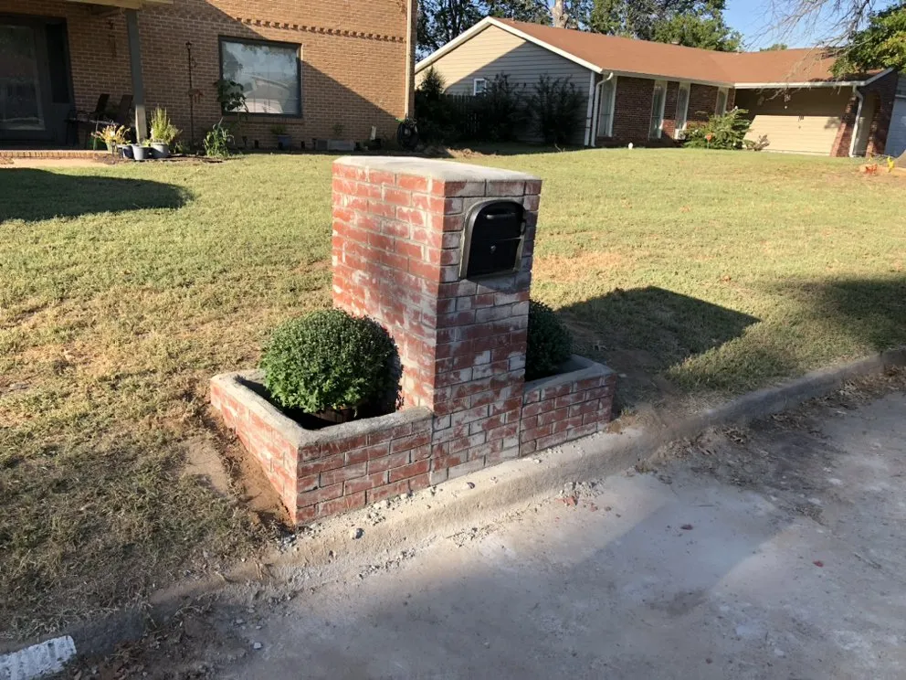 Custom landscaping services with custom design in Tulsa, OK by Disaster Aid