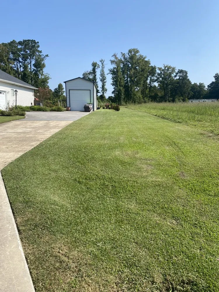 Expert landscaping services for residential properties in Jacksonville, NC by Discount Lawn Care