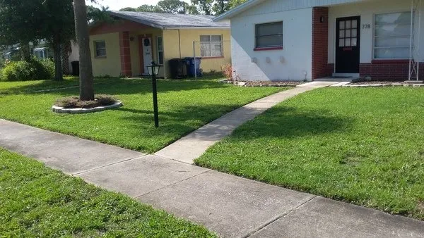 Reliable yard maintenance with custom design in St Petersburg, FL by Discount Lawn Cuts