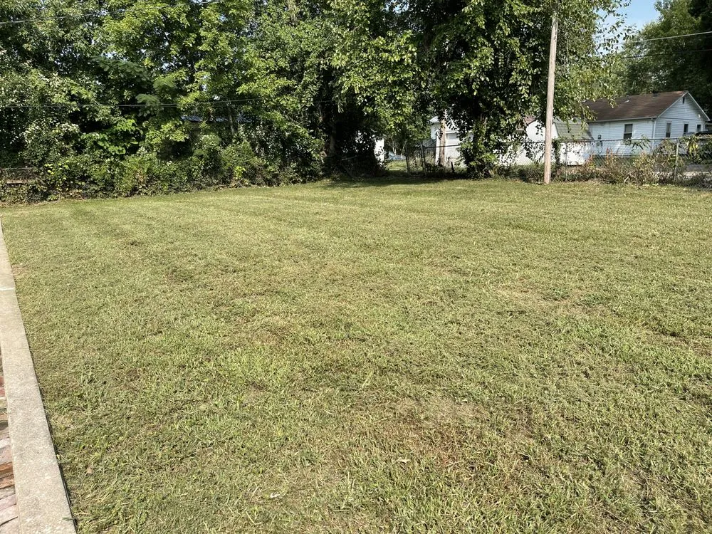 Local yard maintenance with custom design in Sedalia, MO by Discount Lawn Services