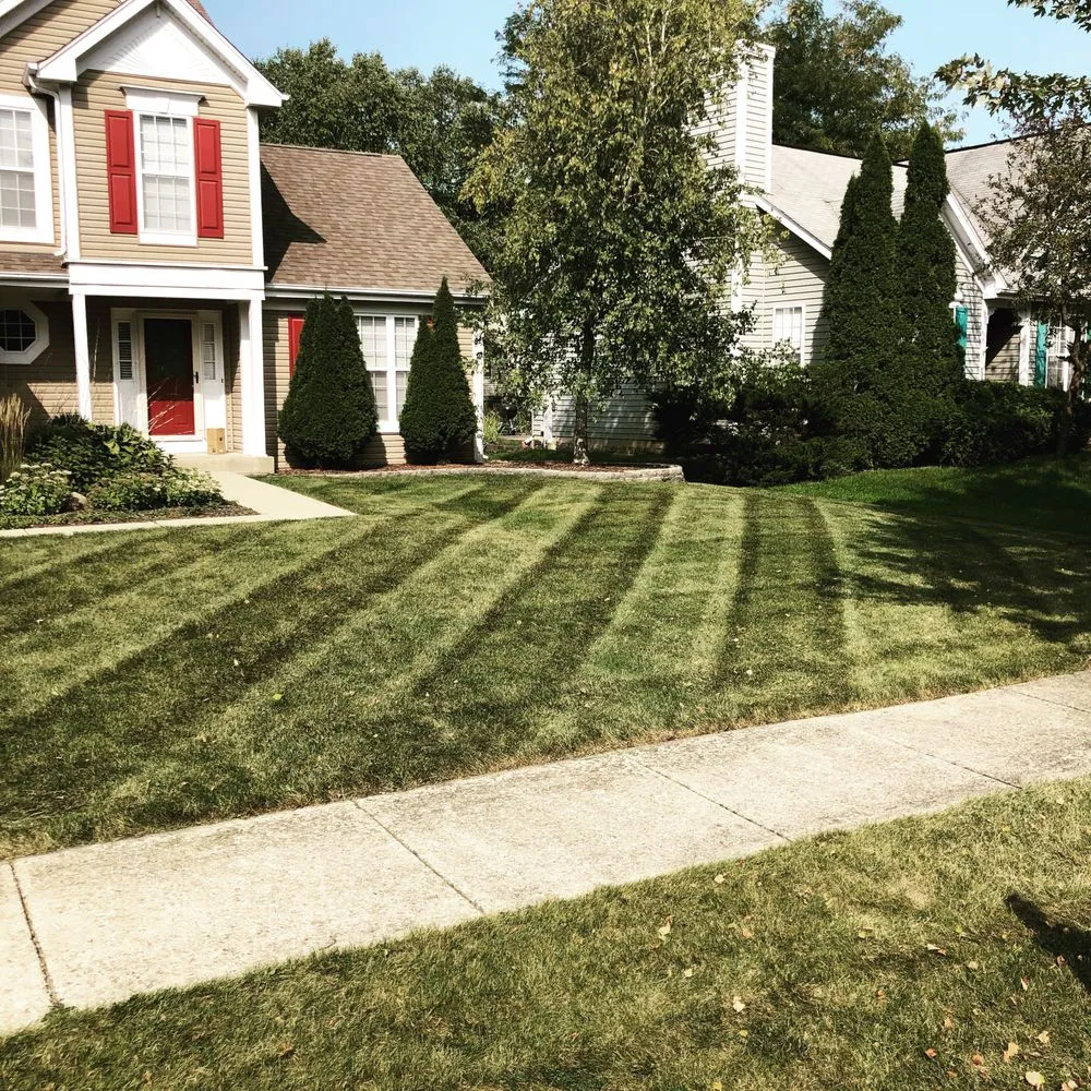 Custom lawn mowing service for beautiful yards in Plainfield, IL by Distinctive Concepts Lawn & Landscape