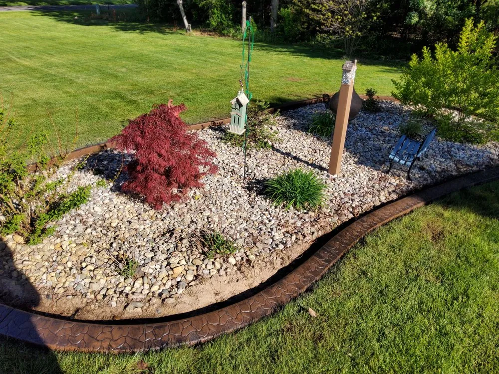 Reliable lawn care service for homes across Middleville, MI - Distinctive Edge Concrete Landscape Edging