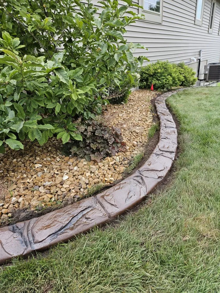 Trusted yard cleanup service in Middleville, MI by Distinctive Edge Concrete Landscape Edging
