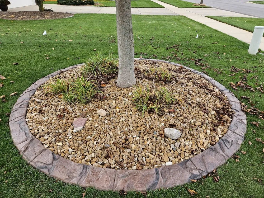 Expert lawn mowing service for beautiful yards across Middleville, MI - Distinctive Edge Concrete Landscape Edging