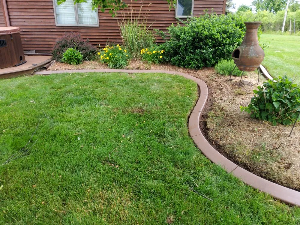 Local lawn care service for homes in Middleville, MI by Distinctive Edge Concrete Landscape Edging