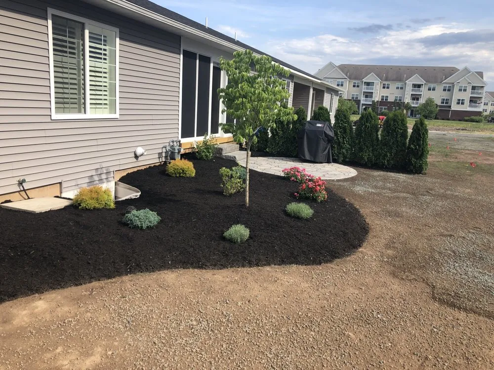 Local yard cleanup service near you in Baldwinsville, NY by Distinguished Landscapes