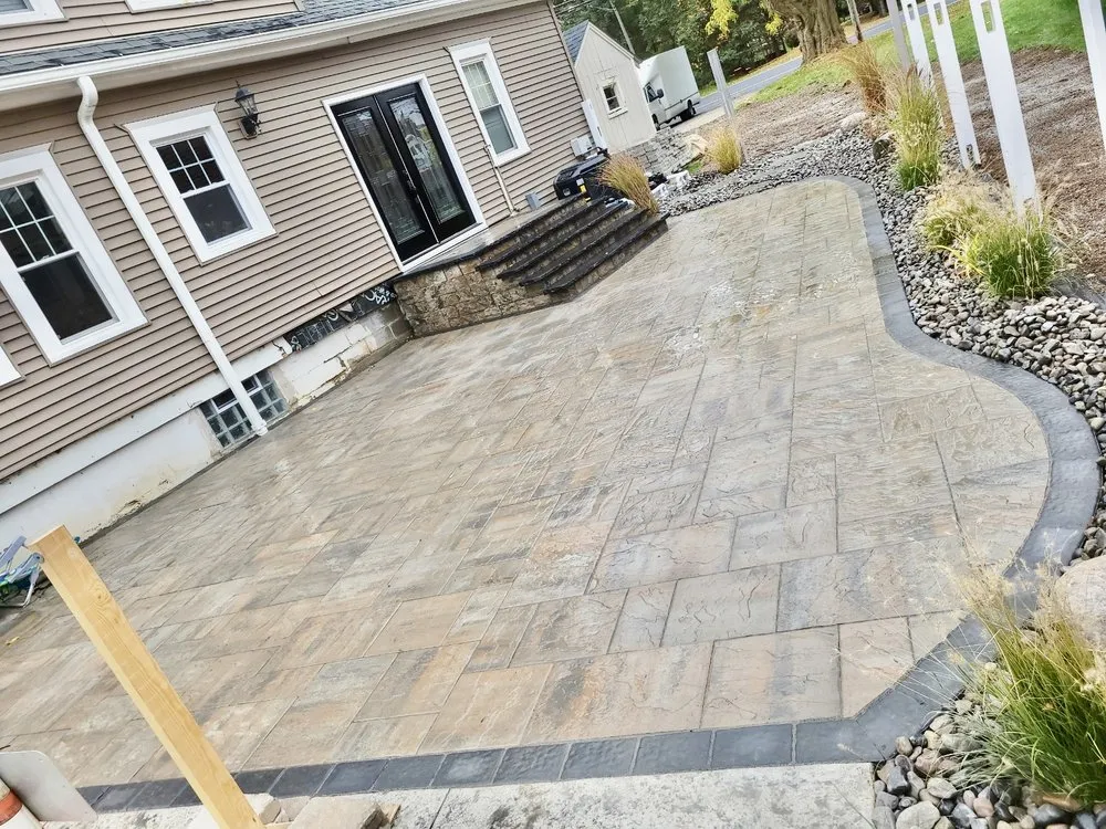 Reliable yard cleanup service for outdoor upgrades in Baldwinsville, NY by Distinguished Landscapes