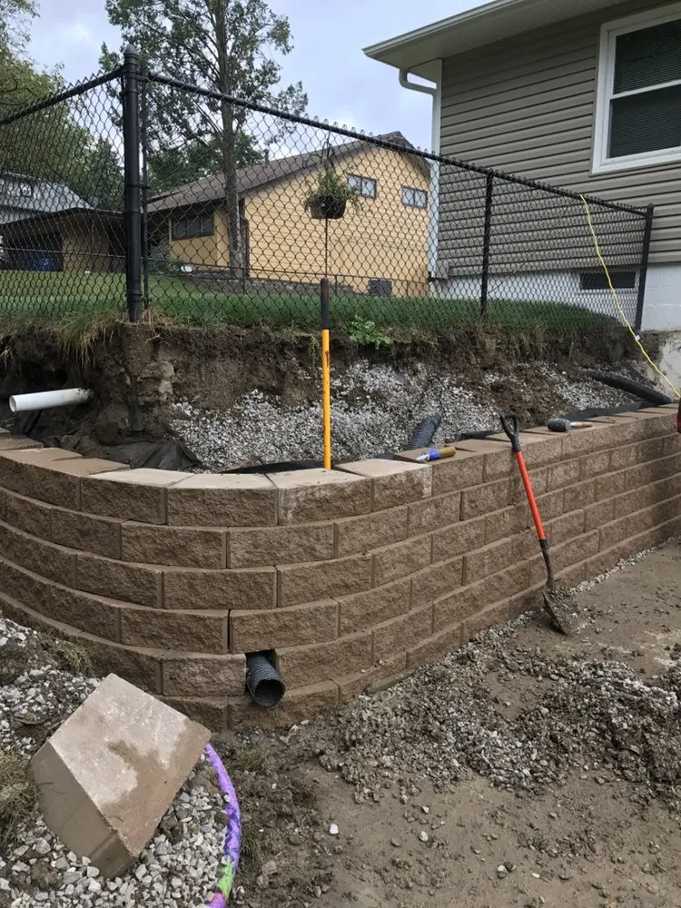 Custom yard maintenance for residential properties across West Des Moines, IA - D&J Outdoor Solutions