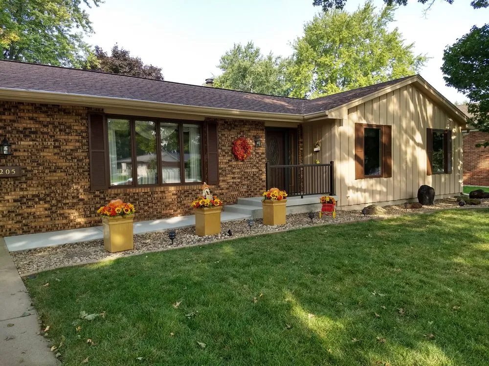 Expert lawn mowing service with custom design in Bloomington, IL by DJ's Painting & Remodeling