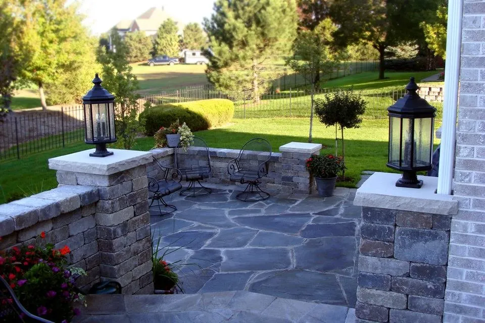 Custom landscape design for residential properties in Bloomington, IL by DJ's Painting & Remodeling