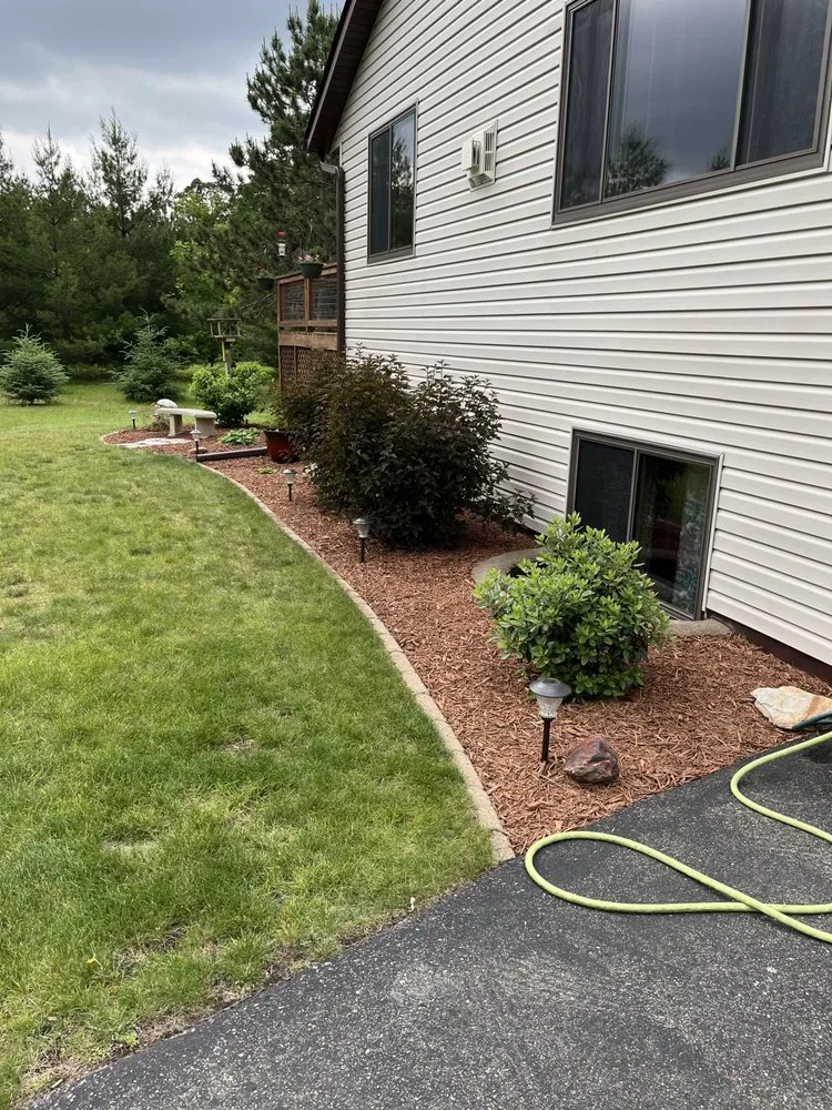 Professional yard cleanup service with custom design in Brainerd, MN by Djs Property Maintenance