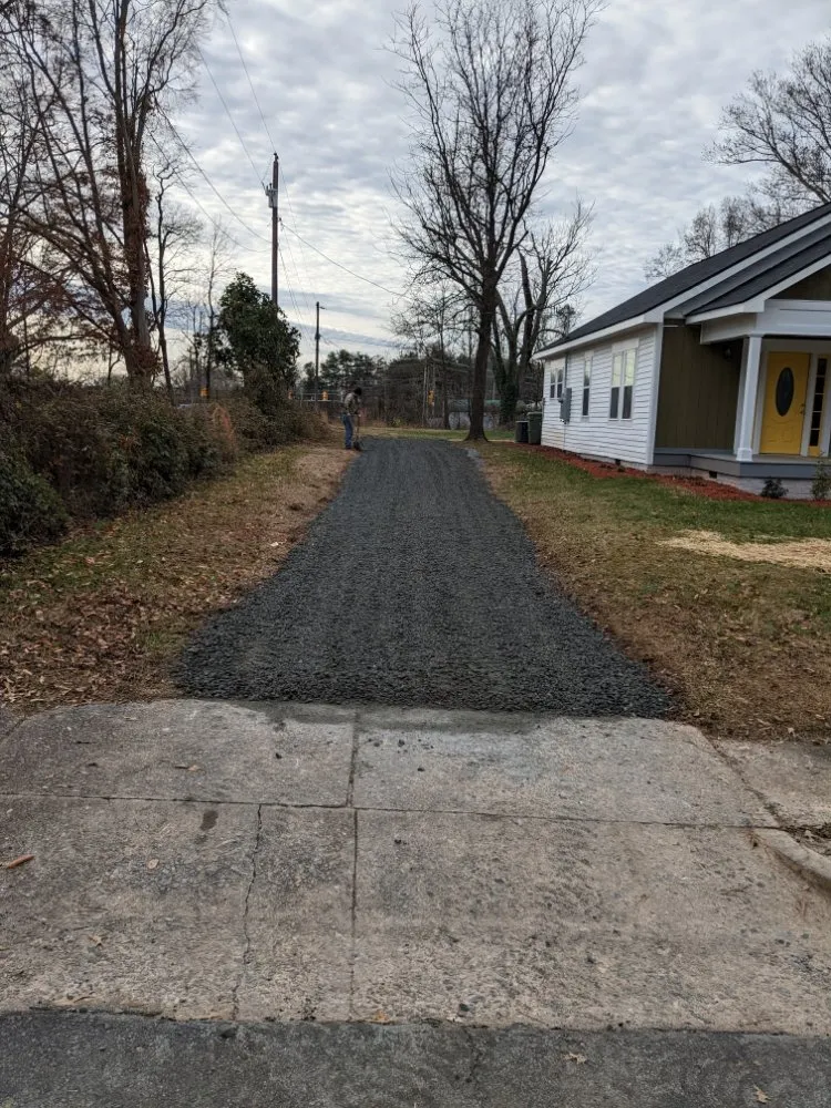 Affordable lawn care service for residential properties across Forest City, NC - D&L tractor work & Landscaping