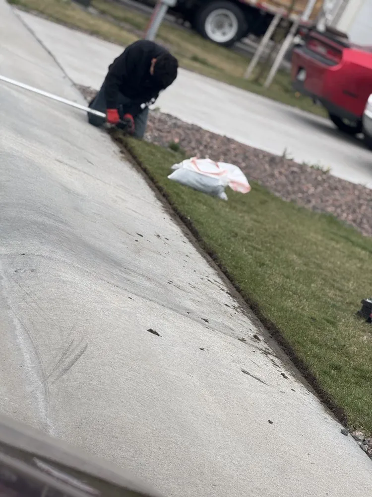 Affordable lawn care service for residential properties in Wiggins, CO by DLT Students Lawn Service