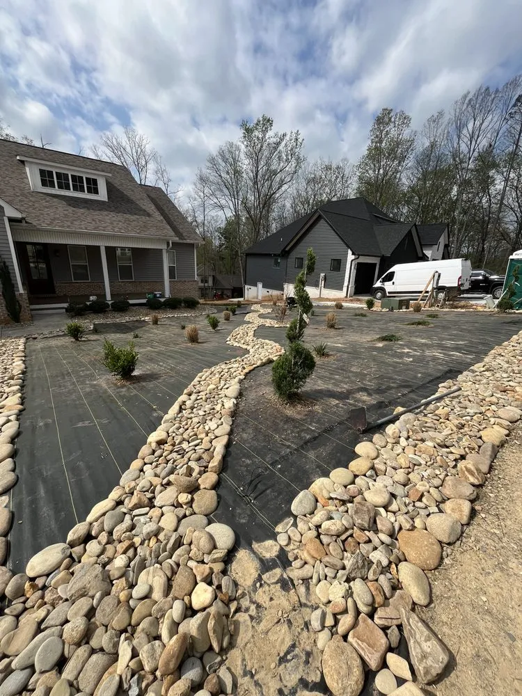 Affordable lawn care service for residential properties in Knoxville, TN by D&M Evergreen Eden Landscaping