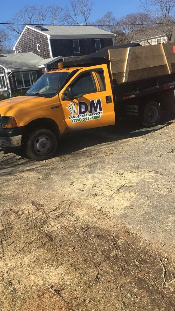 Custom landscape installation for outdoor upgrades across Mashpee, MA - DM Landscape Services