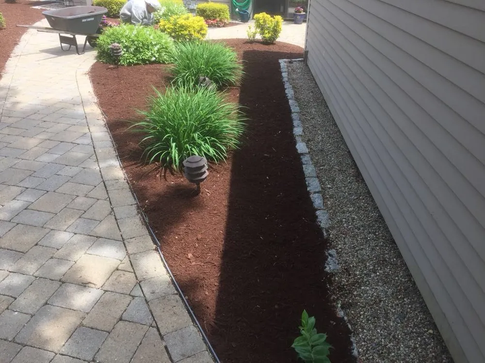 Expert landscape design for year-round maintenance across Mashpee, MA - DM Landscape Services