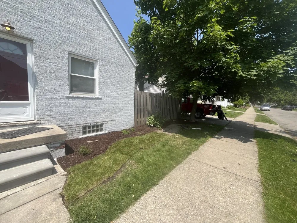 Affordable lawn mowing service for homes in Pontiac, MI by Dm Landscaping and Junk Removal